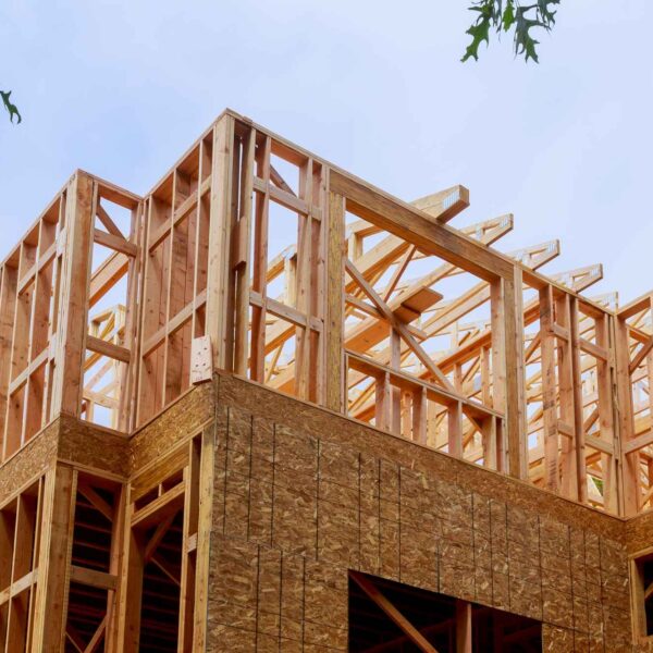 New Home Construction building of exterior wood frame and beam construction