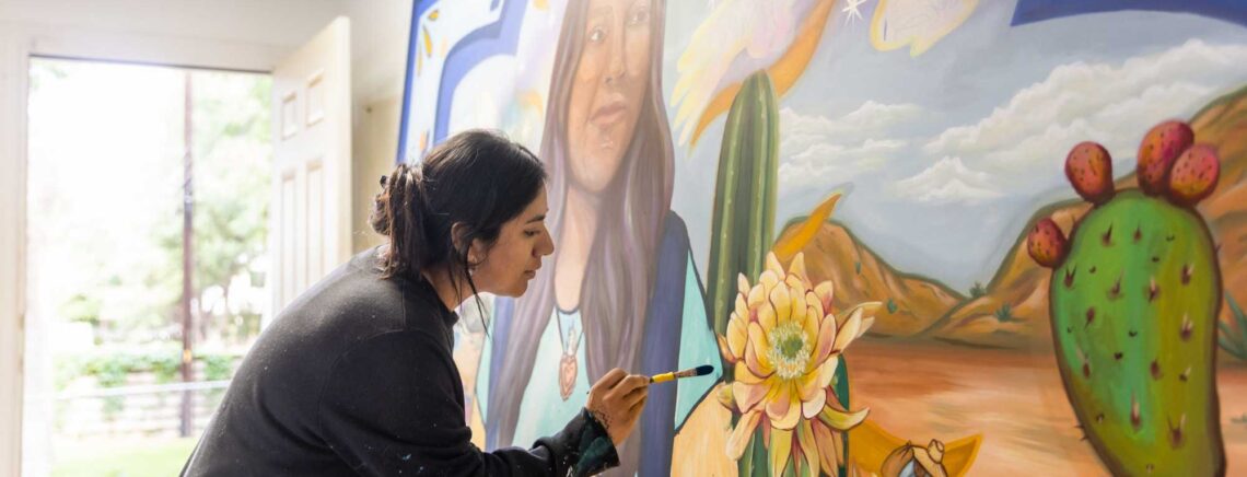 Artist Carmen Rangel works on a mural painting on Wednesday, April 5, 2023, at her home studio in Austin Texas. Rangel is an alumna of Austin Community College and the artwork was commissioned by ACC for the new Latin American Cultural Center, formerly known as the Latino/Latin American Studies Center, located at the Riverside Campus.