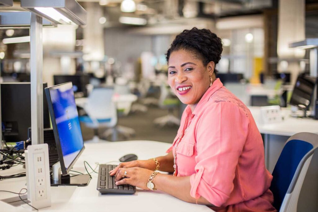 An Austin Community College CSIT graduate works at the HLC Accelerator.